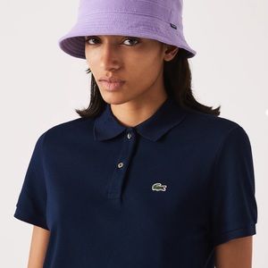 Navy Lacoste polo size 38 women’s. Excellent condition.